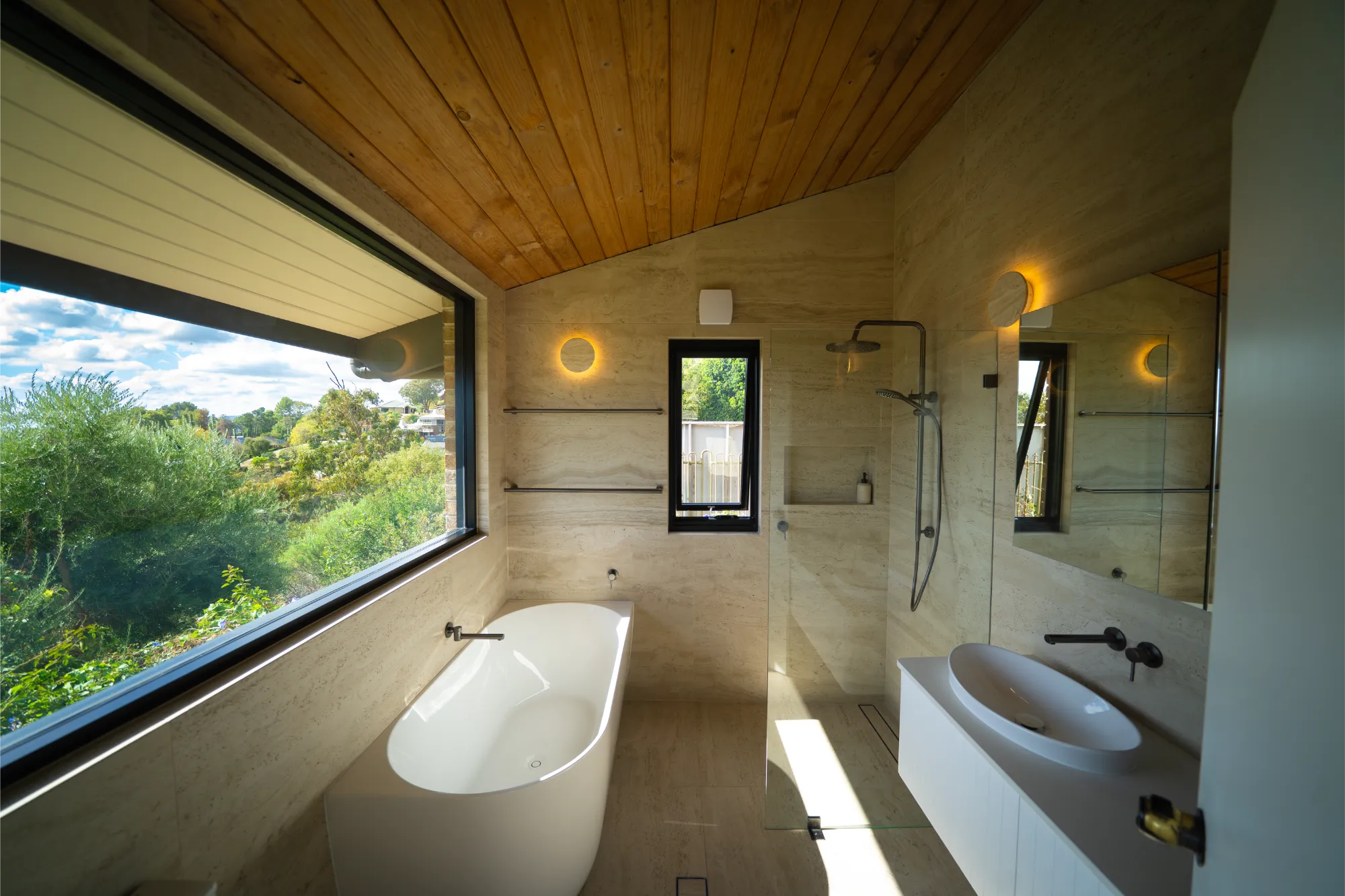 Luxurious bathroom with freestanding bath and natural light